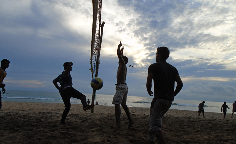Playing Volleyball on Kerala Beach