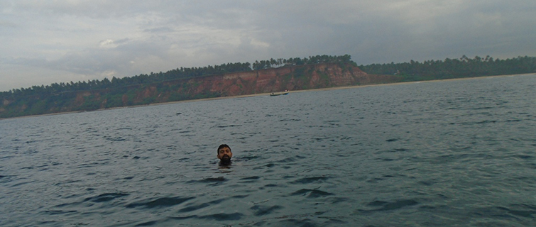 Swimming in Kerala Beach