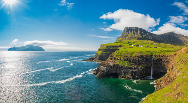 Gasadalur village and Beautiful waterfall, Sunny Day, Vagar, Faroe Islands, Denmark