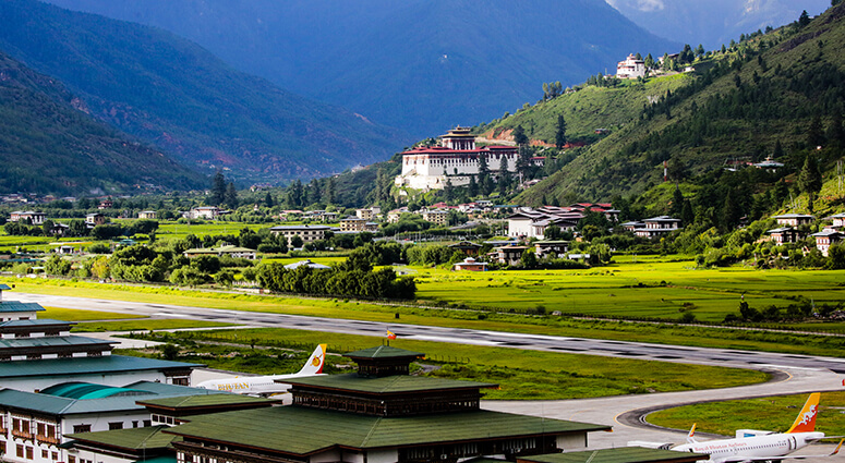 Paro-Rinpung-Dzong-with-Paro-International-Airport-in-the-foreground